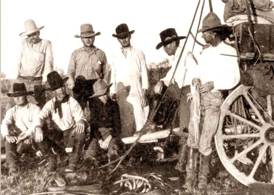 Spur Ranch Cowboys around Hoodlum Wagon in 1910