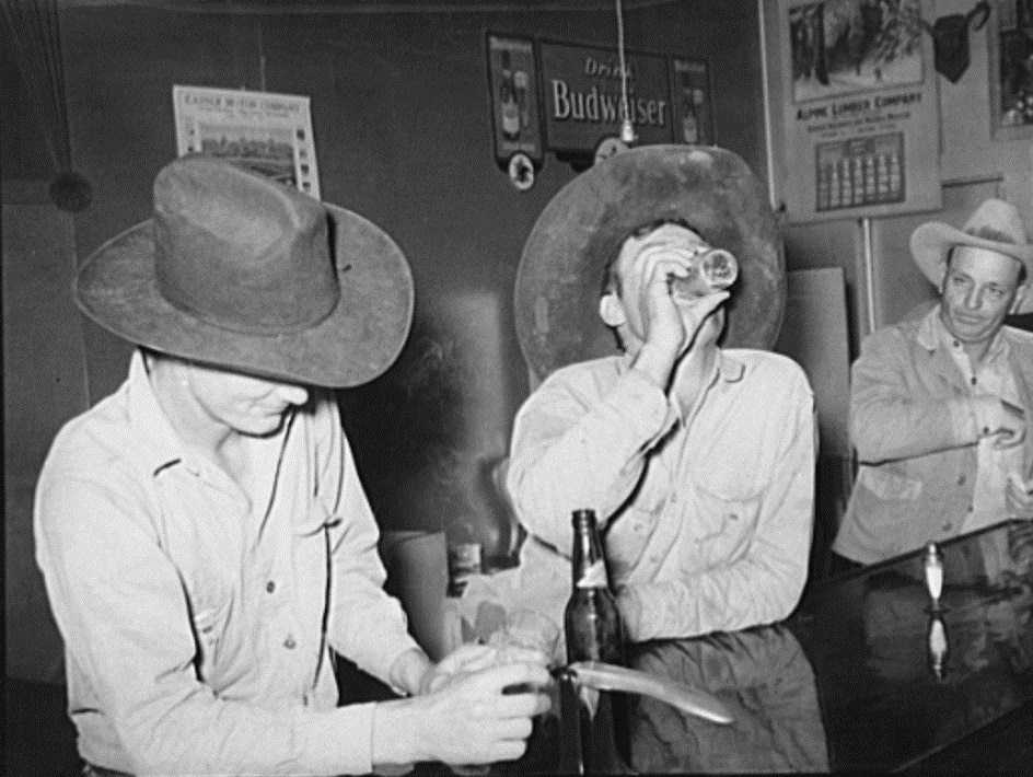 Cowboys In Beer Hall in Alpine, Texas 1939