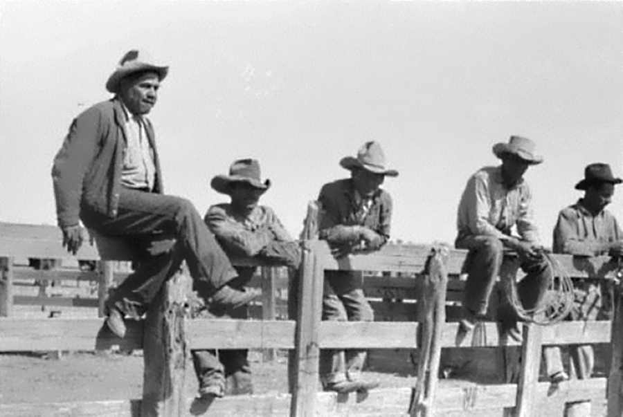 Cowboys Sitting on Corral Fence in 1939