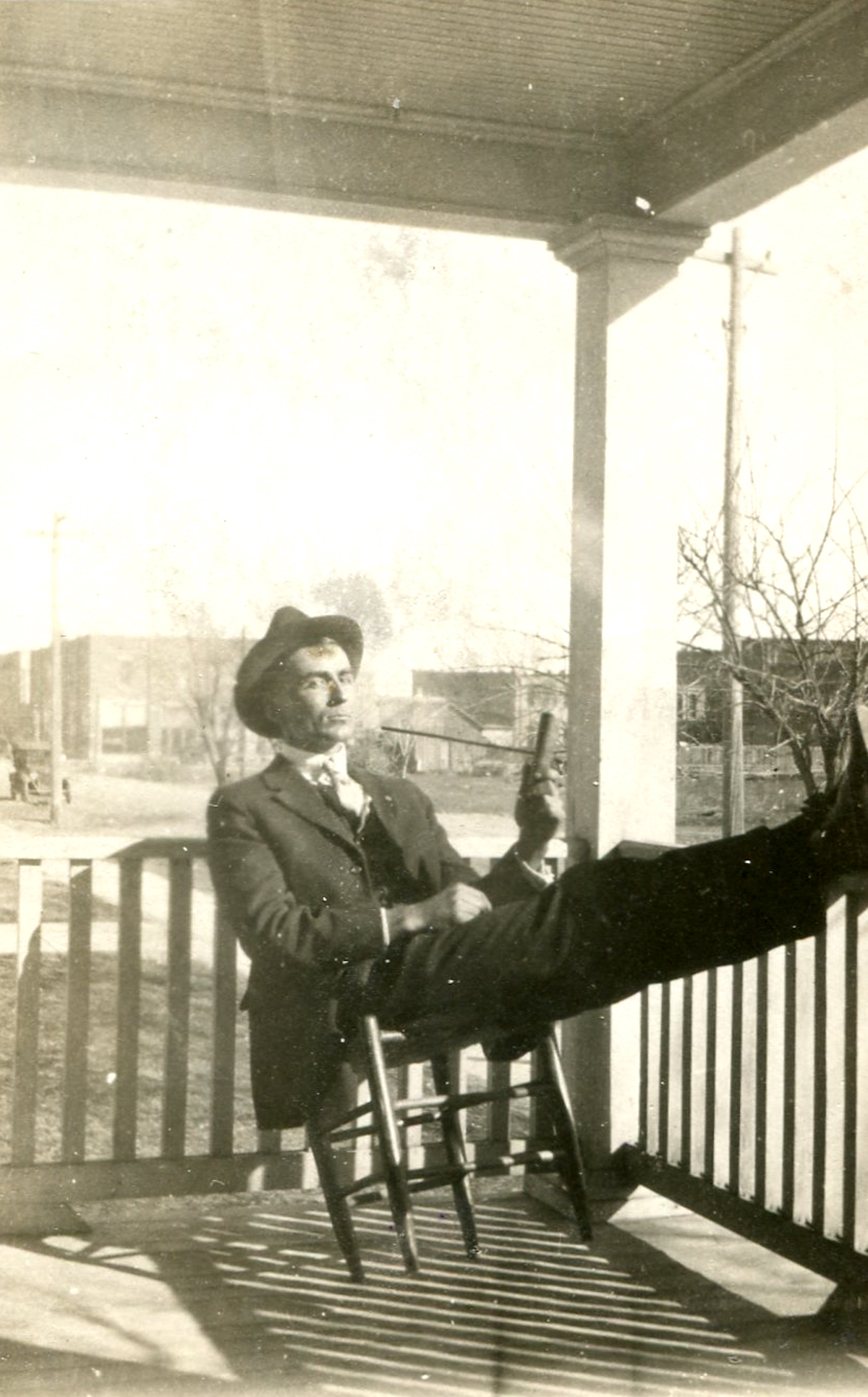 Edward Wykes on his porch in 1914