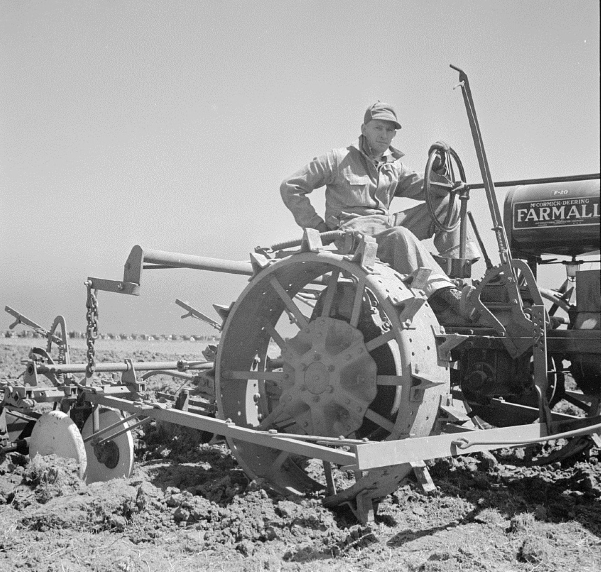 Farmer and His Farmall Tractor 1936