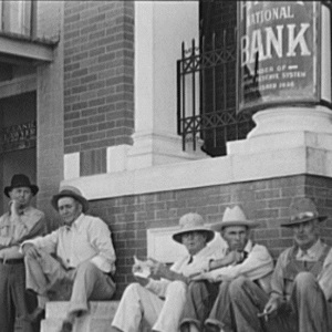 Farmers Sitting on Bank Steps in Memphis Texas in 1939
