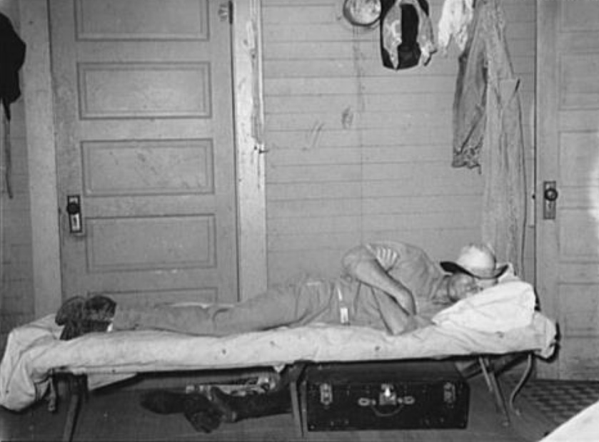 Cowboy Takes a Nap in Bunkhouse in 1939