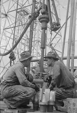 Two Oil Well Workers Near Kilgore, Texas in 1939