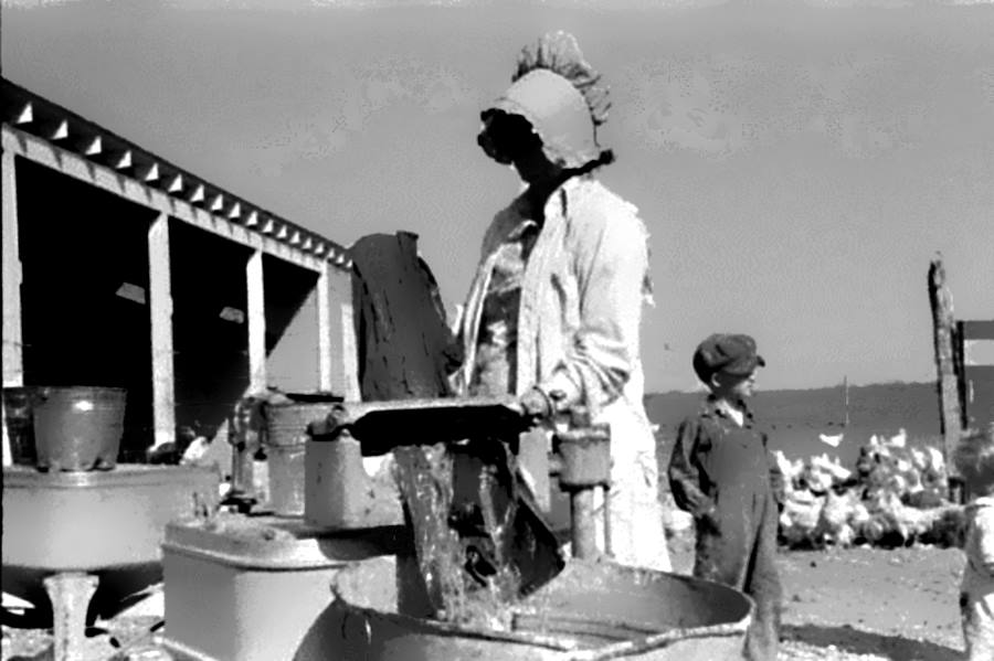 Washing clothes on farm at El Indio, Tx 1939