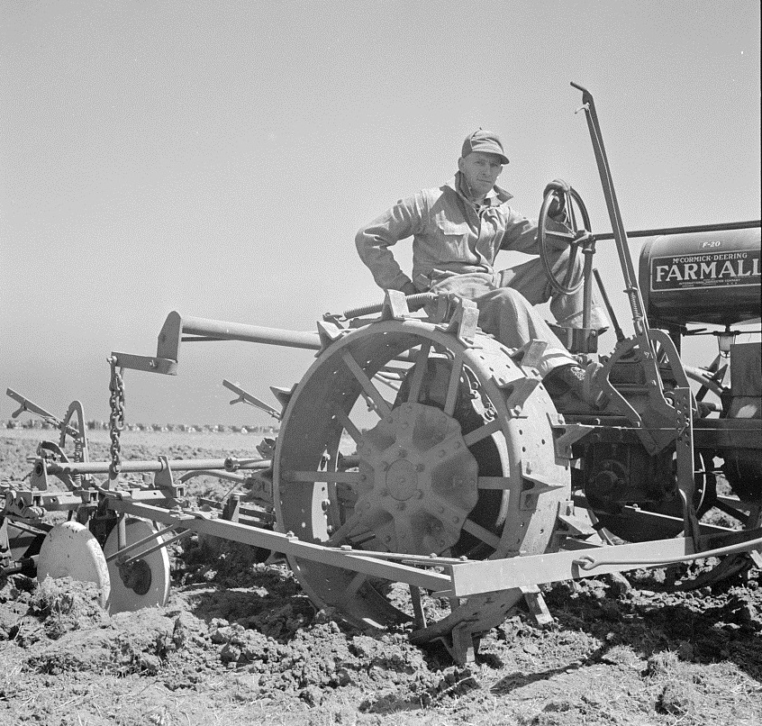 Farmer and His Farmall Tractor 1936