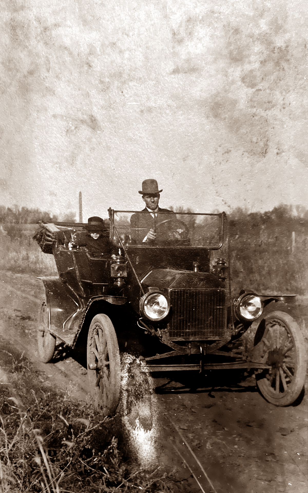 Man and Child in Car in 1913